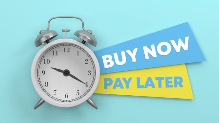 Alarm Clock And Buy Now Pay Later Message On The Label